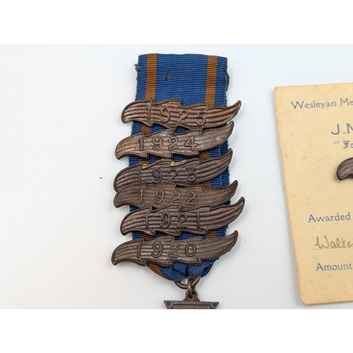 2167 - A 1920s JMC DSO Methodist Missionary Society medal awarded to Walter Avery