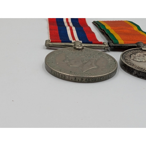 2169 - A WWII medal pair presented to 213392 S.A. Samouilhan