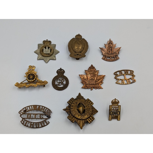 2186 - Ten military items, eight cap badges and two shoulder titles