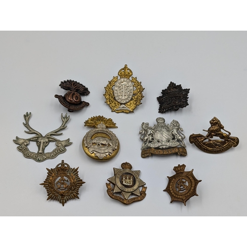 2187 - Ten military cap badges