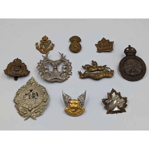 2196 - Ten military cap badges