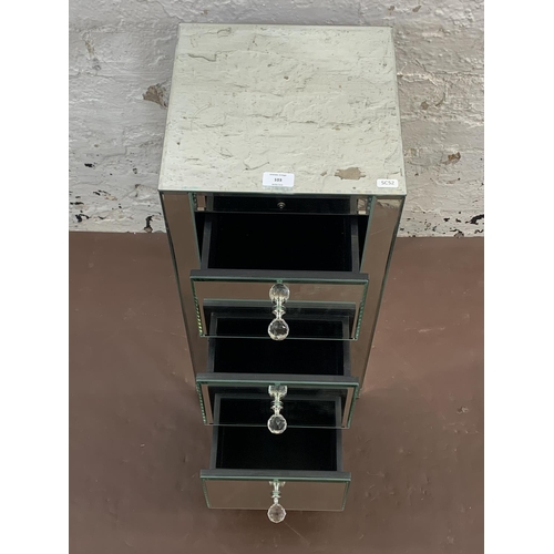 103 - A modern mirrored glass bedside chest of drawers - approx. 60cm high x 30cm wide x 30cm deep