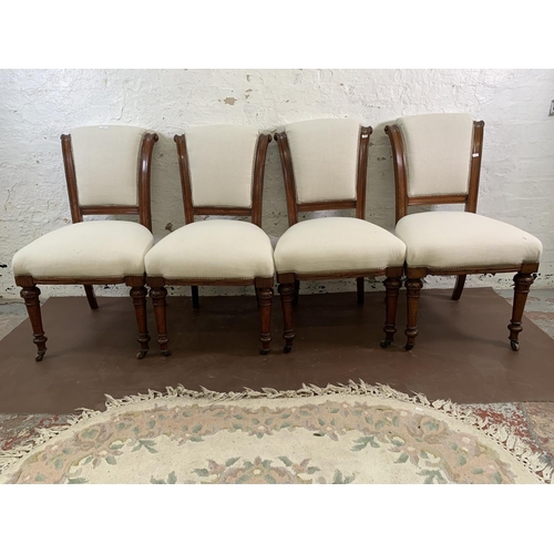 106 - Four 19th century oak and fabric upholstered dining chairs on castors