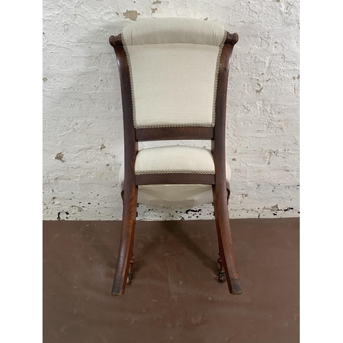 106 - Four 19th century oak and fabric upholstered dining chairs on castors