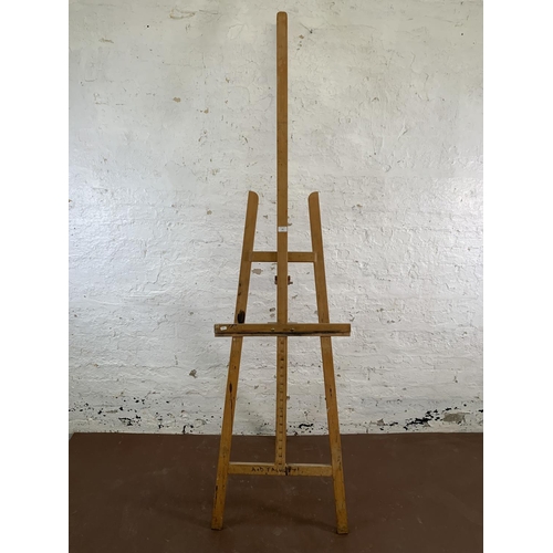 108 - A mid 20th century beech artist's easel - approx. 210cm high x 58cm wide