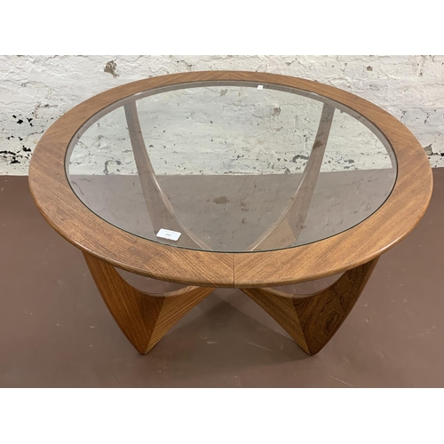 111 - A mid 20th century G Plan Astro teak and glass circular coffee table - approx. 46cm high x 83cm diam... 