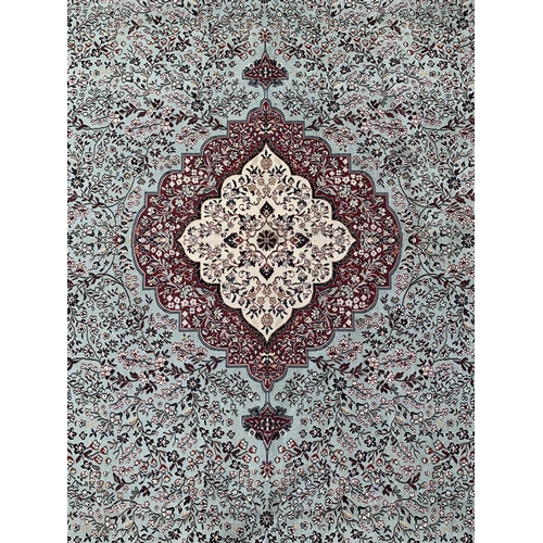 12 - A 20th century machine woven rug - approx. 290cm x 188cm