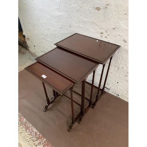 123 - A mahogany nest of three tables - largest approx. 70cm high x 56cm wide x 38cm deep