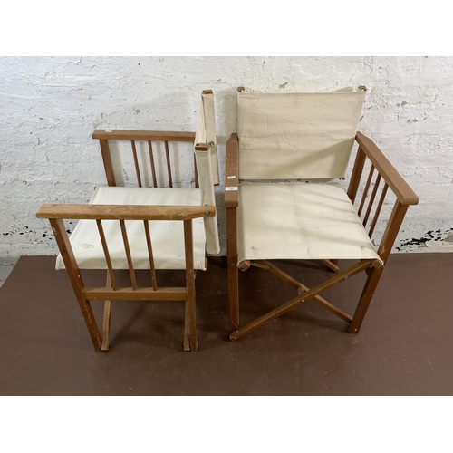 124 - A pair of teak and fabric director's chairs