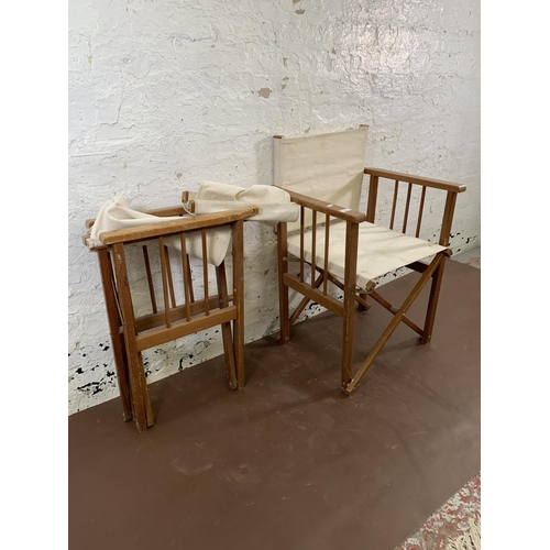 124 - A pair of teak and fabric director's chairs