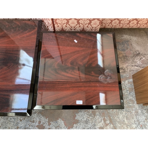 128 - Two Art Deco style high gloss lacquered rosewood effect occasional tables - largest approx. 43cm hig... 