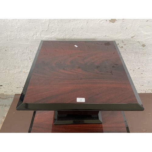 128 - Two Art Deco style high gloss lacquered rosewood effect occasional tables - largest approx. 43cm hig... 