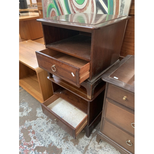 133 - A pair of Stag Minstrel mahogany bedside cabinets - approx. 50cm high x 53cm wide x 47cm deep