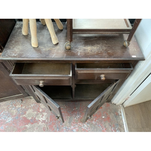 141 - Four pieces of house clearance furniture, one oak sideboard, one mahogany tea trolley, one 1930s oak... 