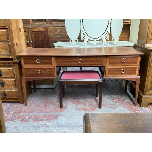 145A - A Stag Minstrel mahogany dressing table and stool - approx. 72cm high x 153cm wide x 46cm deep