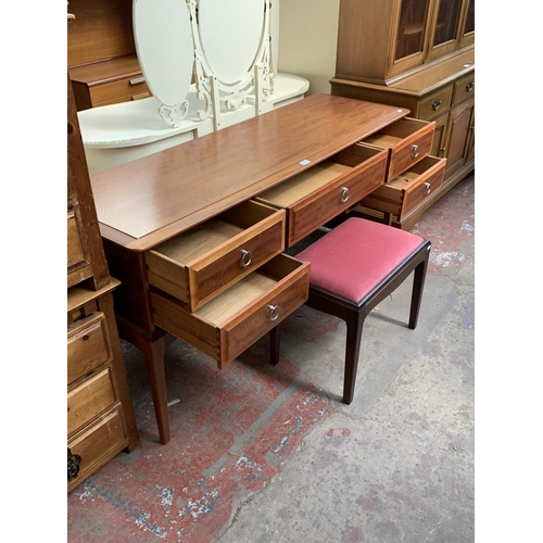 145A - A Stag Minstrel mahogany dressing table and stool - approx. 72cm high x 153cm wide x 46cm deep