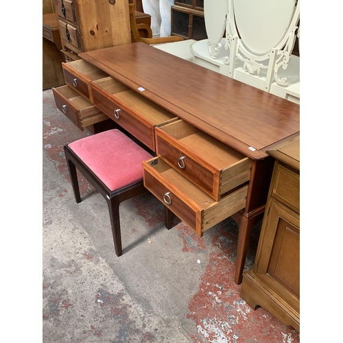 145A - A Stag Minstrel mahogany dressing table and stool - approx. 72cm high x 153cm wide x 46cm deep