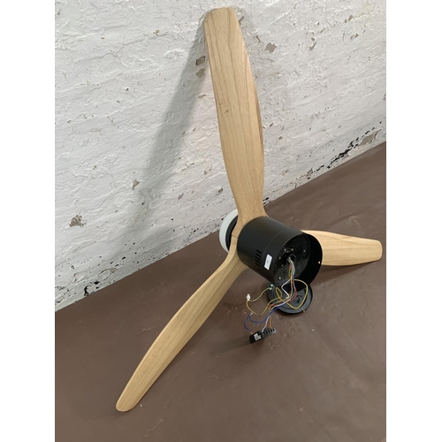 151 - A modern black metal and wood propeller ceiling fan light - approx. 115cm diameter x 31cm high