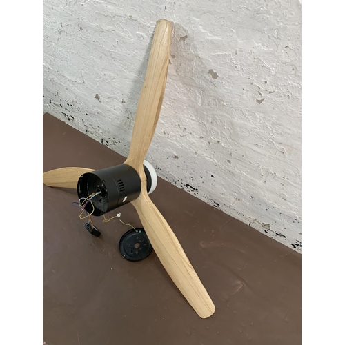 151 - A modern black metal and wood propeller ceiling fan light - approx. 115cm diameter x 31cm high