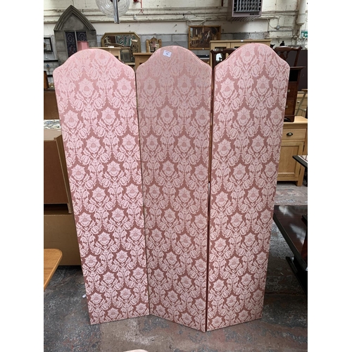 154 - Three pieces of pink floral fabric upholstered furniture, one three section folding dressing screen ... 