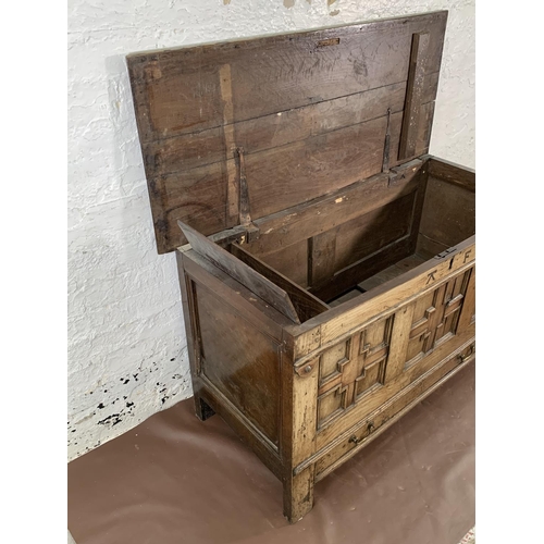 159 - A Georgian carved oak three panel mule chest - approx. 72cm high x 125cm wide x 55cm deep