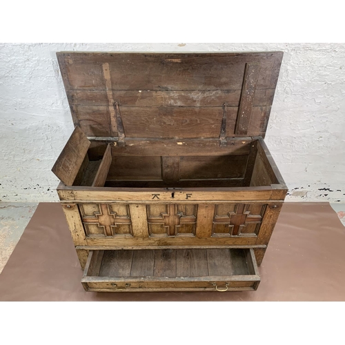 159 - A Georgian carved oak three panel mule chest - approx. 72cm high x 125cm wide x 55cm deep