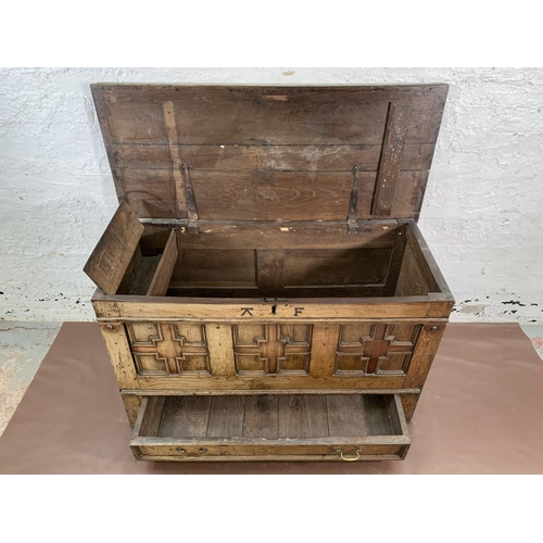 159 - A Georgian carved oak three panel mule chest - approx. 72cm high x 125cm wide x 55cm deep