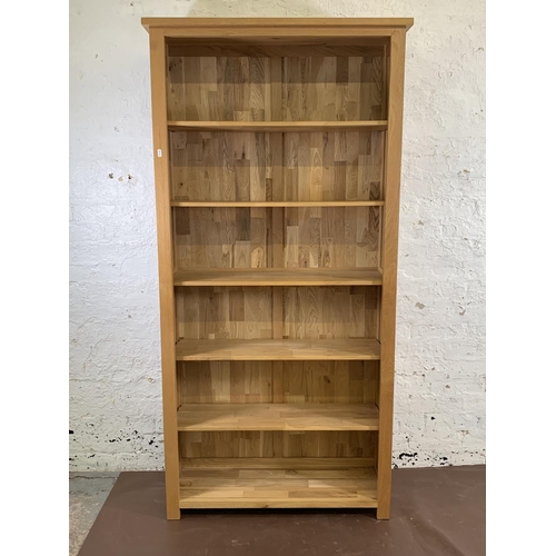 161C - A modern oak six tier bookcase - approx. 185cm high x 92cm wide x 30cm deep