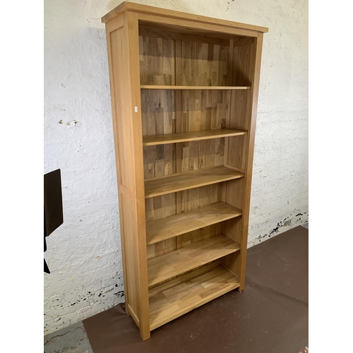 161C - A modern oak six tier bookcase - approx. 185cm high x 92cm wide x 30cm deep