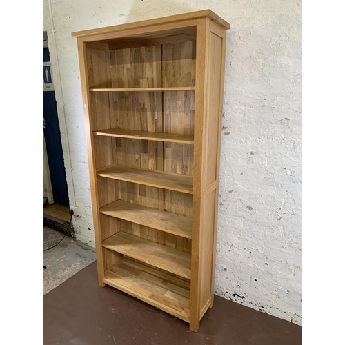 161C - A modern oak six tier bookcase - approx. 185cm high x 92cm wide x 30cm deep