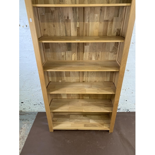 161C - A modern oak six tier bookcase - approx. 185cm high x 92cm wide x 30cm deep