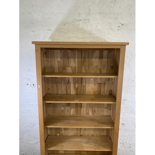 161C - A modern oak six tier bookcase - approx. 185cm high x 92cm wide x 30cm deep