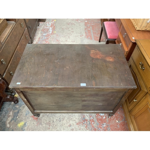 161D - A mid 20th century R. H. Whittle & Sons Ltd stained plywood blanket box on castors - approx. 69cm hi... 