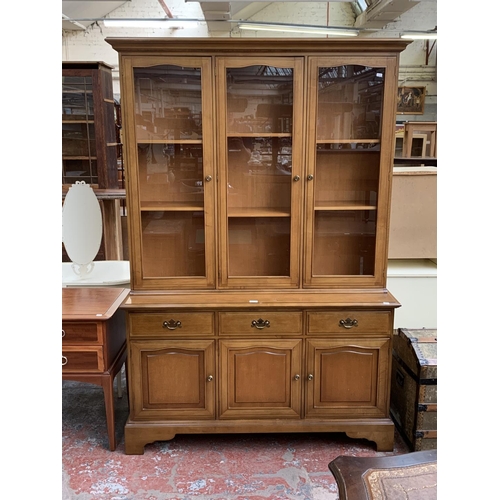 161F - A Stag Madrigal display cabinet - approx. 197cm high x 133cm wide x 46cm deep