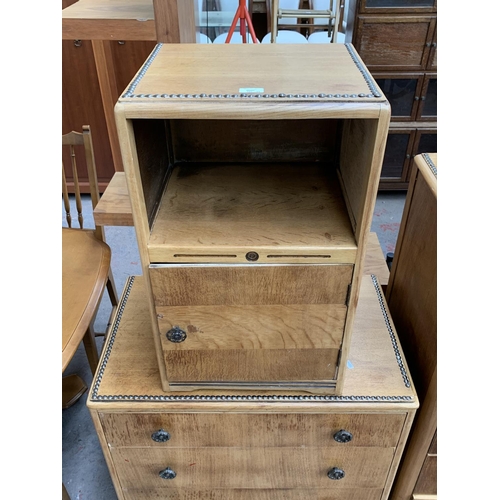 161H - An Art Deco style oak three piece bedroom suite with metal beaded decoration comprising two chests o... 