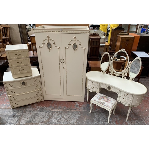 165 - A French Louis XV style white painted and gilded four piece bedroom suite comprising chest of drawer... 