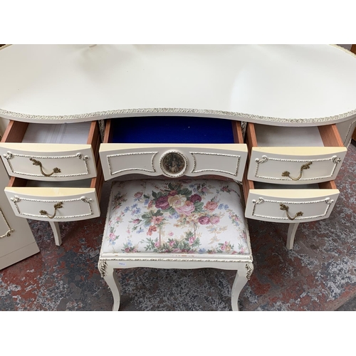 165 - A French Louis XV style white painted and gilded four piece bedroom suite comprising chest of drawer... 