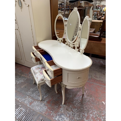 165 - A French Louis XV style white painted and gilded four piece bedroom suite comprising chest of drawer... 