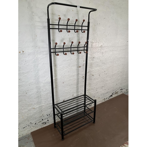 167 - A mid 20th century style black tubular metal sputnik coat stand - approx. 188cm high x 68cm wide x 3... 