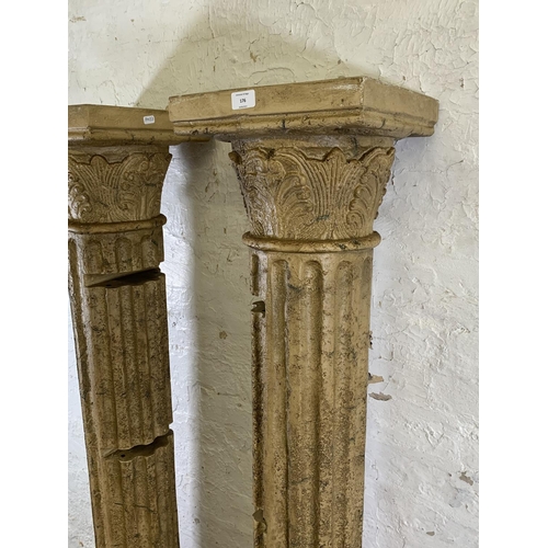 176 - A pair of fibreglass Corinthian column shelving units - approx. 180cm high x 30cm wide x 30cm deep