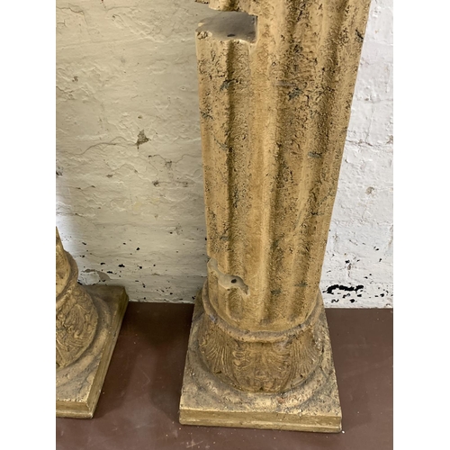 176 - A pair of fibreglass Corinthian column shelving units - approx. 180cm high x 30cm wide x 30cm deep