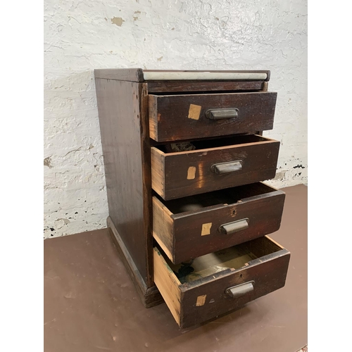 180 - An early 20th century stained pitch pine and marble top four drawer office filing cabinet - approx. ... 