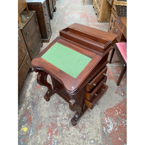 184 - A 19th century style mahogany Davenport desk with green leather writing surface and carved supports ... 