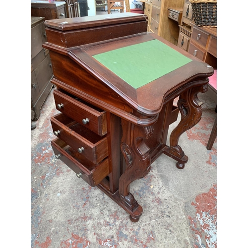 184 - A 19th century style mahogany Davenport desk with green leather writing surface and carved supports ... 