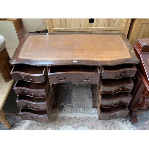 186 - A 19th century style mahogany serpentine twin pedestal writing desk with tan leather insert - approx... 