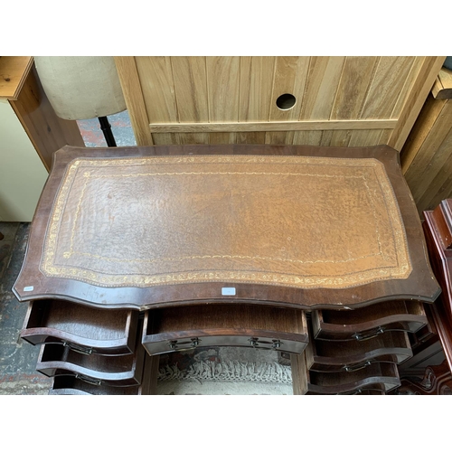 186 - A 19th century style mahogany serpentine twin pedestal writing desk with tan leather insert - approx... 