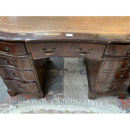 186 - A 19th century style mahogany serpentine twin pedestal writing desk with tan leather insert - approx... 