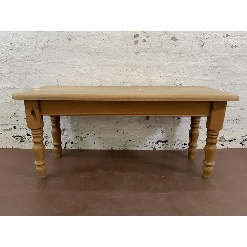 188 - A solid pine rectangular coffee table - approx. 47cm high x 46cm wide x 107cm long