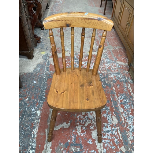 189 - A pine rectangular dining table and three chairs - approx. 77cm high x 68cm wide x 106cm long