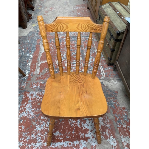 190 - Four pine spindle back farmhouse dining chairs